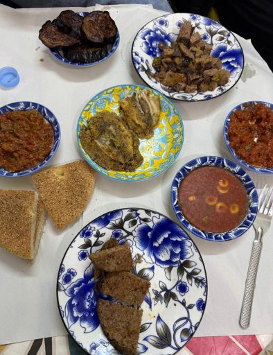 Apetizers salads and fried sardines